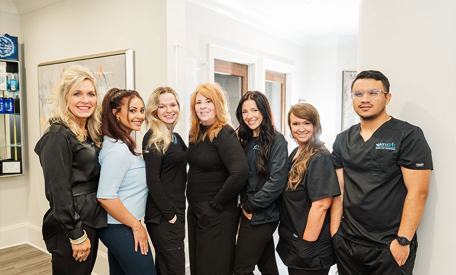 The ProGrin augusta road dental team smiling together